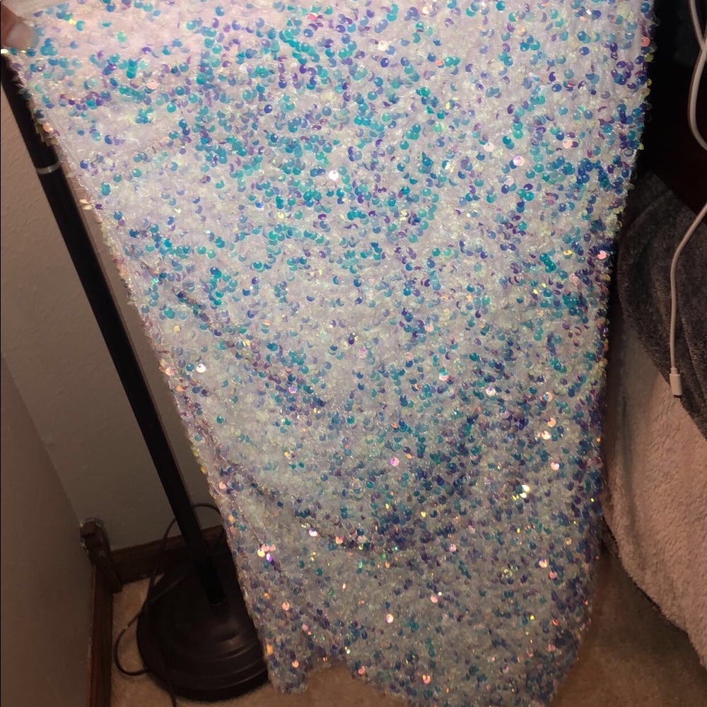 It’s a short one strap dress, from Lucy in the sky.Only used one time.
